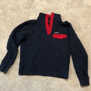 Patagonia Navy Quilted Pullover. Possibly L, but more like a Medium